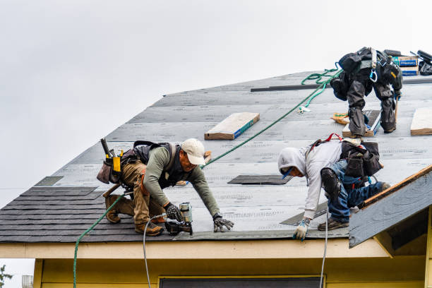 Professional Gutter Installation technician working in Moorefield, KY